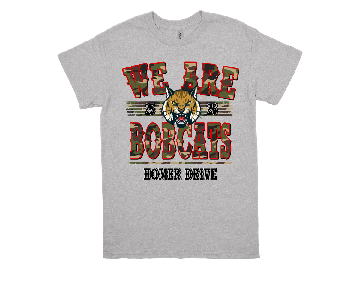 Gray Homer Drive WE ARE BOBCATS spirit shirt with bobcat mascot and red camouflage text