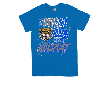 Blue ODOM "Great Day To Be A Wildcat" spirit shirt with wildcat mascot graphic and bold text design