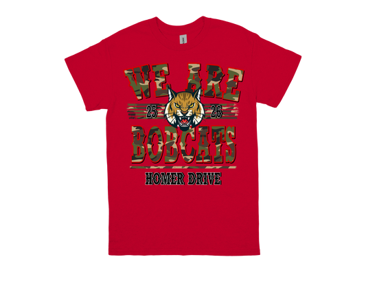 Red Homer Drive "WE ARE BOBCATS" spirit shirt with camo text and bobcat mascot design