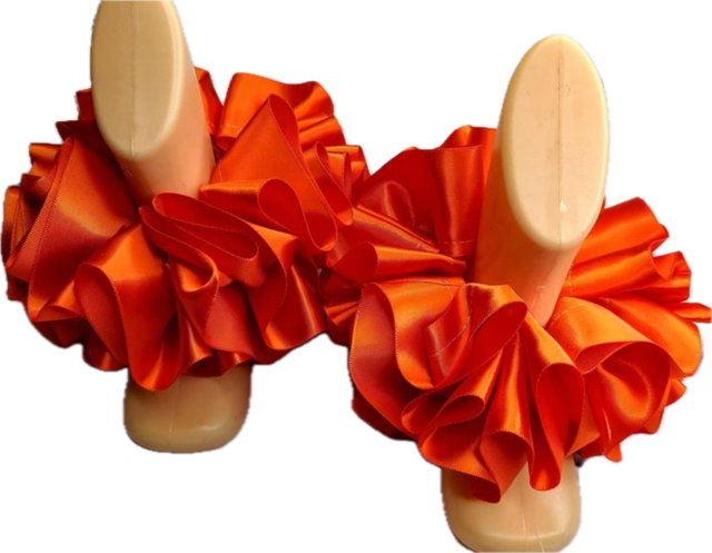 Orange single color anklets with ruffled satin design on mannequin feet